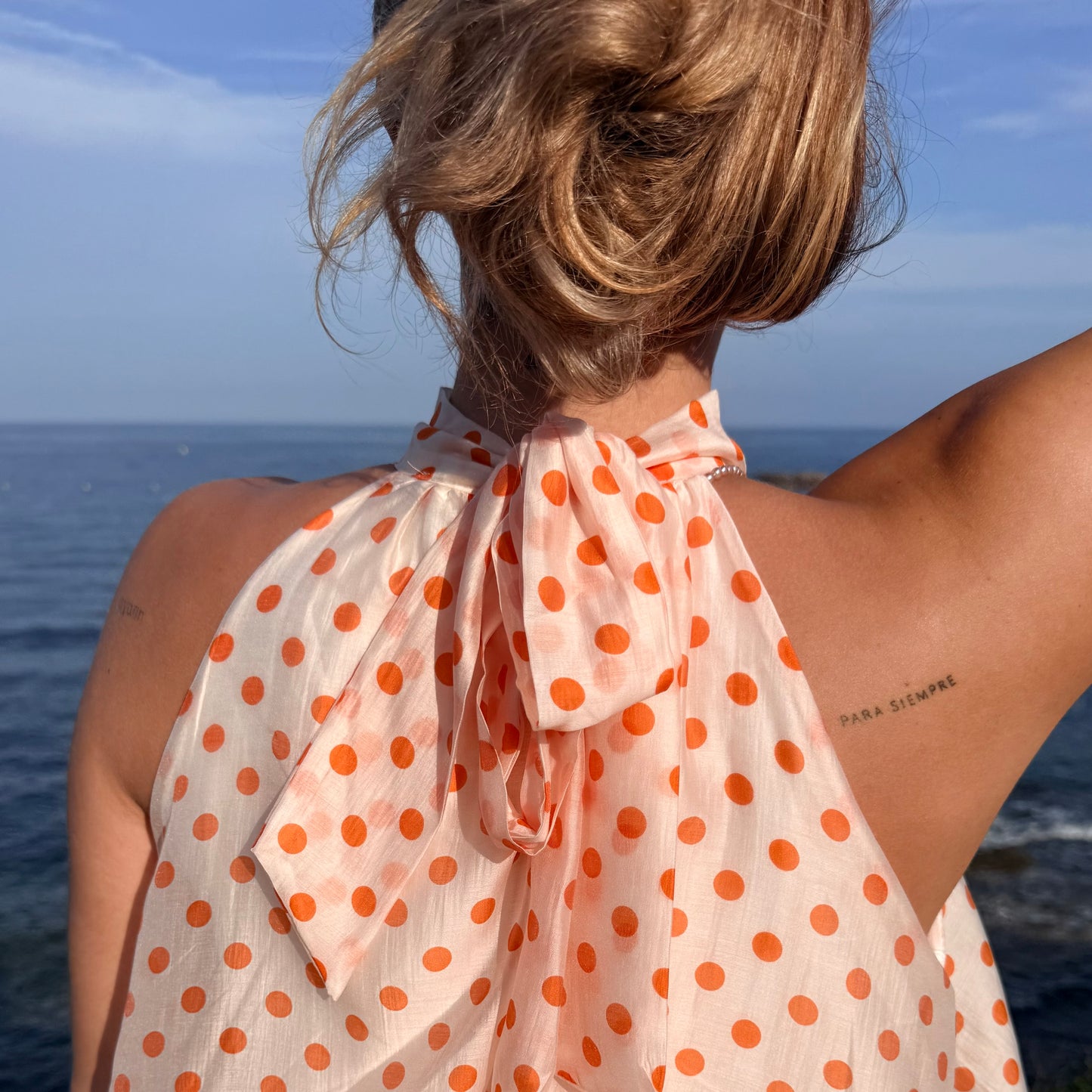 Top à pois orange