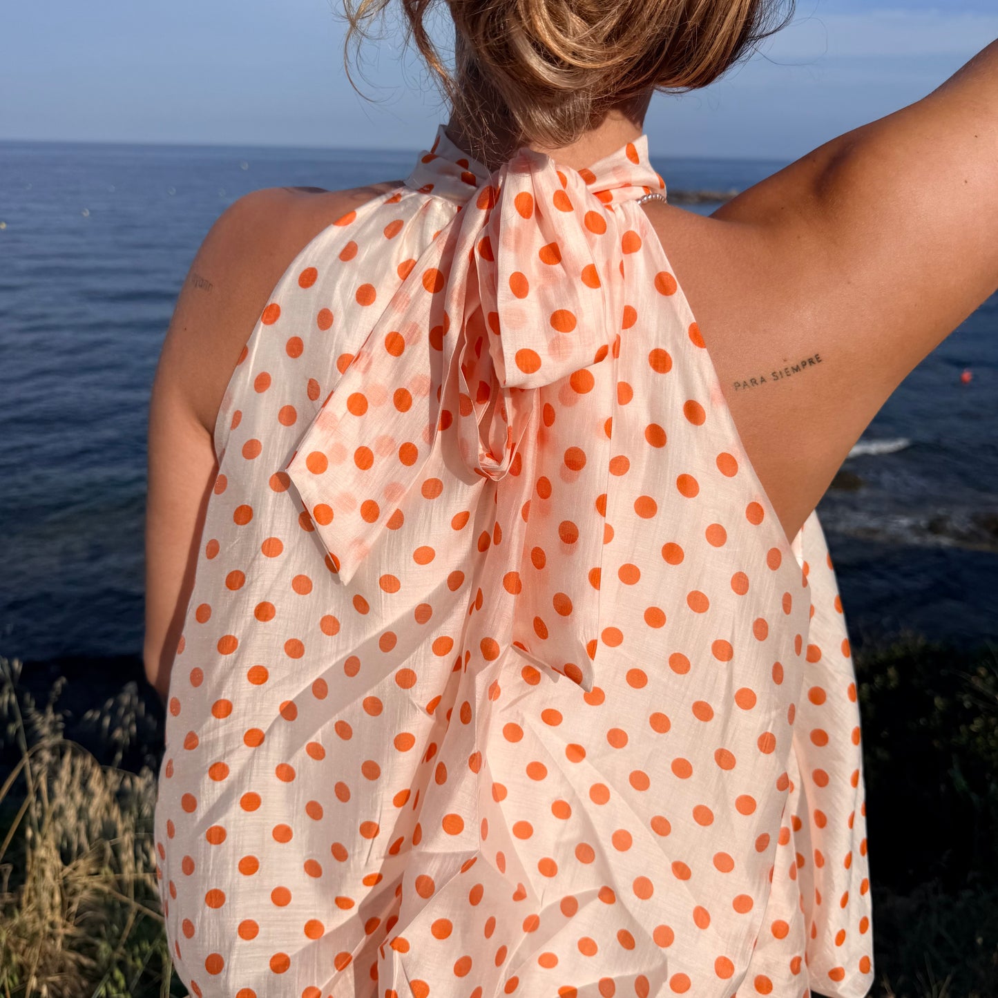 Top à pois orange