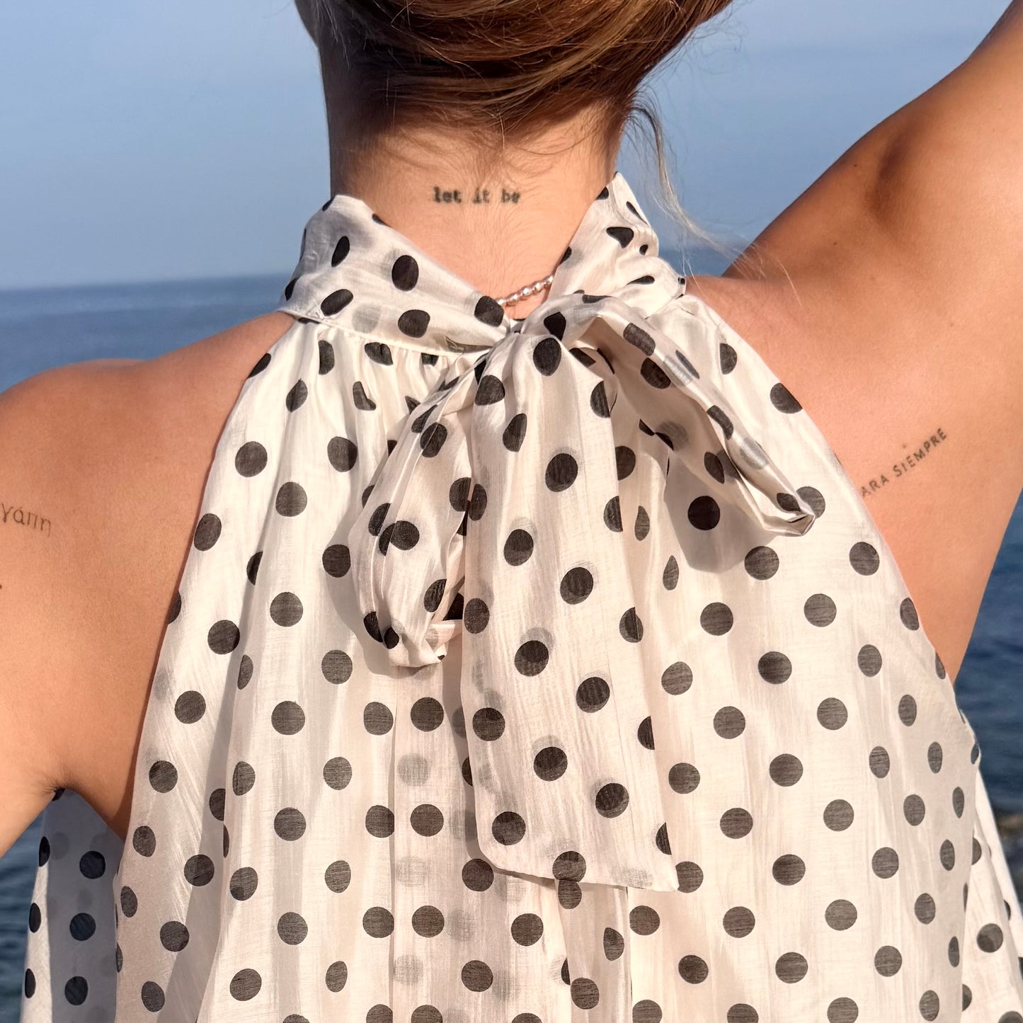 Top à pois noir